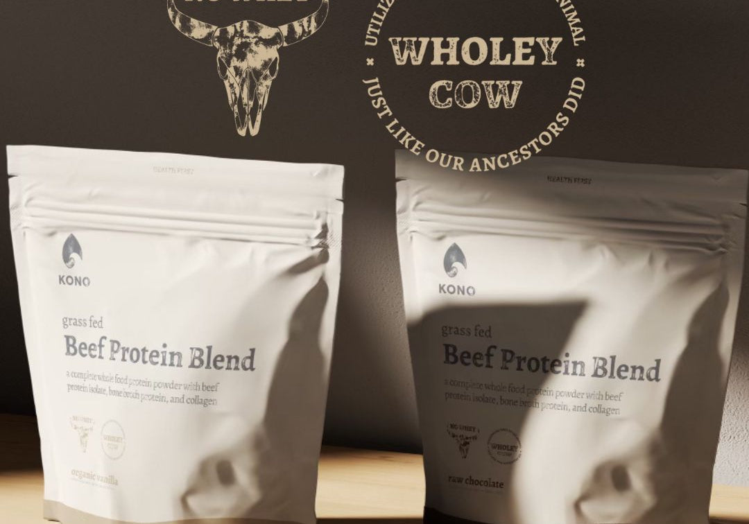 KONO grass-fed Beef Protein Blend pouches on a wooden shelf with “No Whey” longhorn skull and “Wholey Cow – utilizing all parts of the animal” badges on the wall