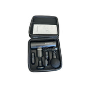 KONO Mini Massage Gun travel case—portable percussion massager kit with device, USB charging cable, and four attachments neatly organized.