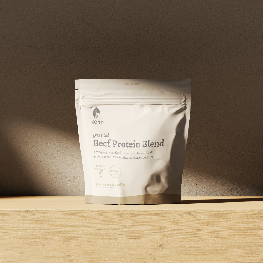  KONO Beef Protein Blend -Madagascar vanilla pouch on a wooden shelf in soft natural light.