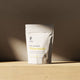 KONO bio-available Magnesium, Lemon & Chamomile—stand-up pouch on a wooden shelf in soft light.